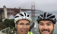 Brian and Jacobey Johnson at the Golden Gate Bridge during their Bike for Purpose fundraiser.