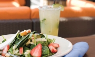 A cucumber pear margarita and a fresh spinach salad on the patio at 3 Squares Restaurant means summer is finally here to stay. 