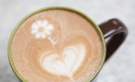 Eric Adolphson makes latte coffee art at the Daily Dose in Maple Grove.