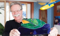 Stained glass artist Mac McMillan in his Maple Grove studio.