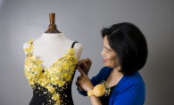 Ann Tran designs and alters clothing for her customers in Maple Grove