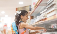 A girl shops for back to school supplies.