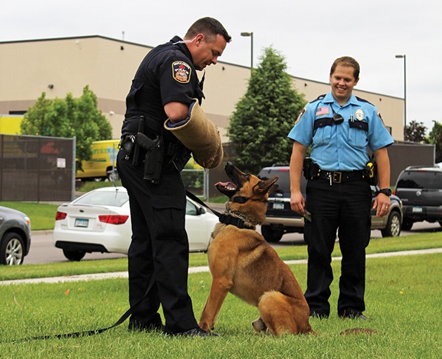 Officers perform a K9 demonstration at the Feeding Furry Friends Family Fun Day.