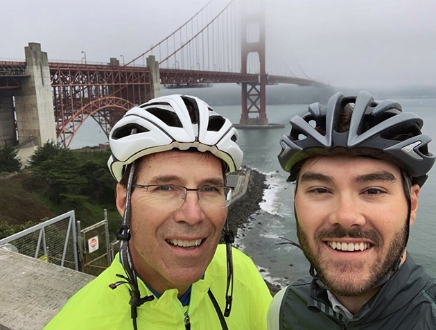 Brian and Jacobey Johnson at the Golden Gate Bridge during their Bike for Purpose fundraiser.