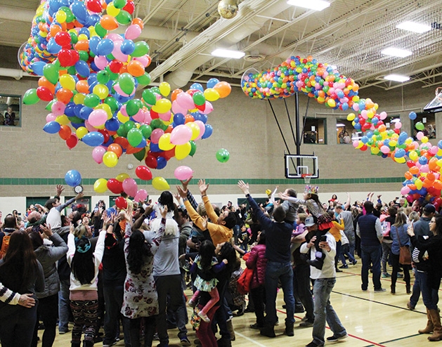 Residents celebrate New Year's Eve at the Maple Grove Community Center