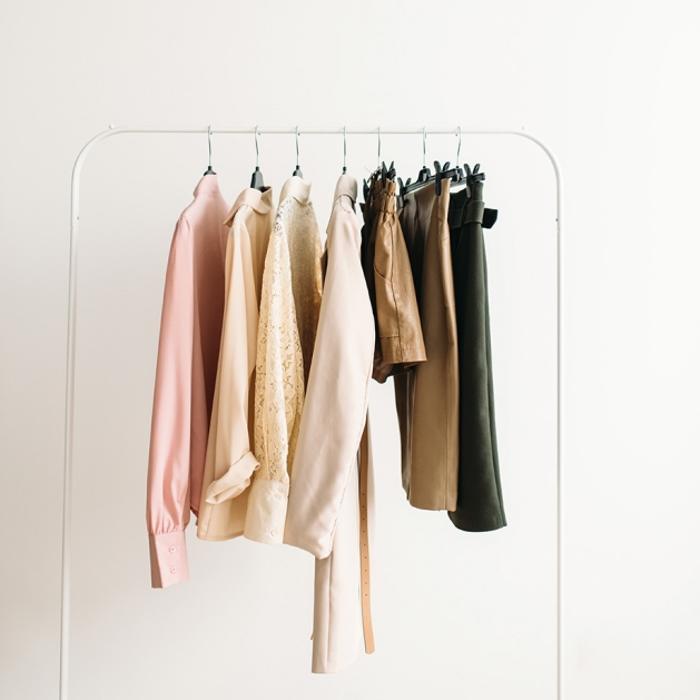 Clothes on a clothing rack.