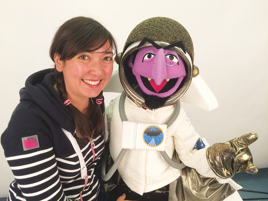 Liz Hara with the Count, wearing the spacesuit she designed.