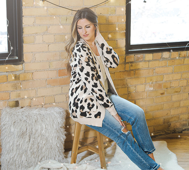 An animal print sweater from Tula Boutique